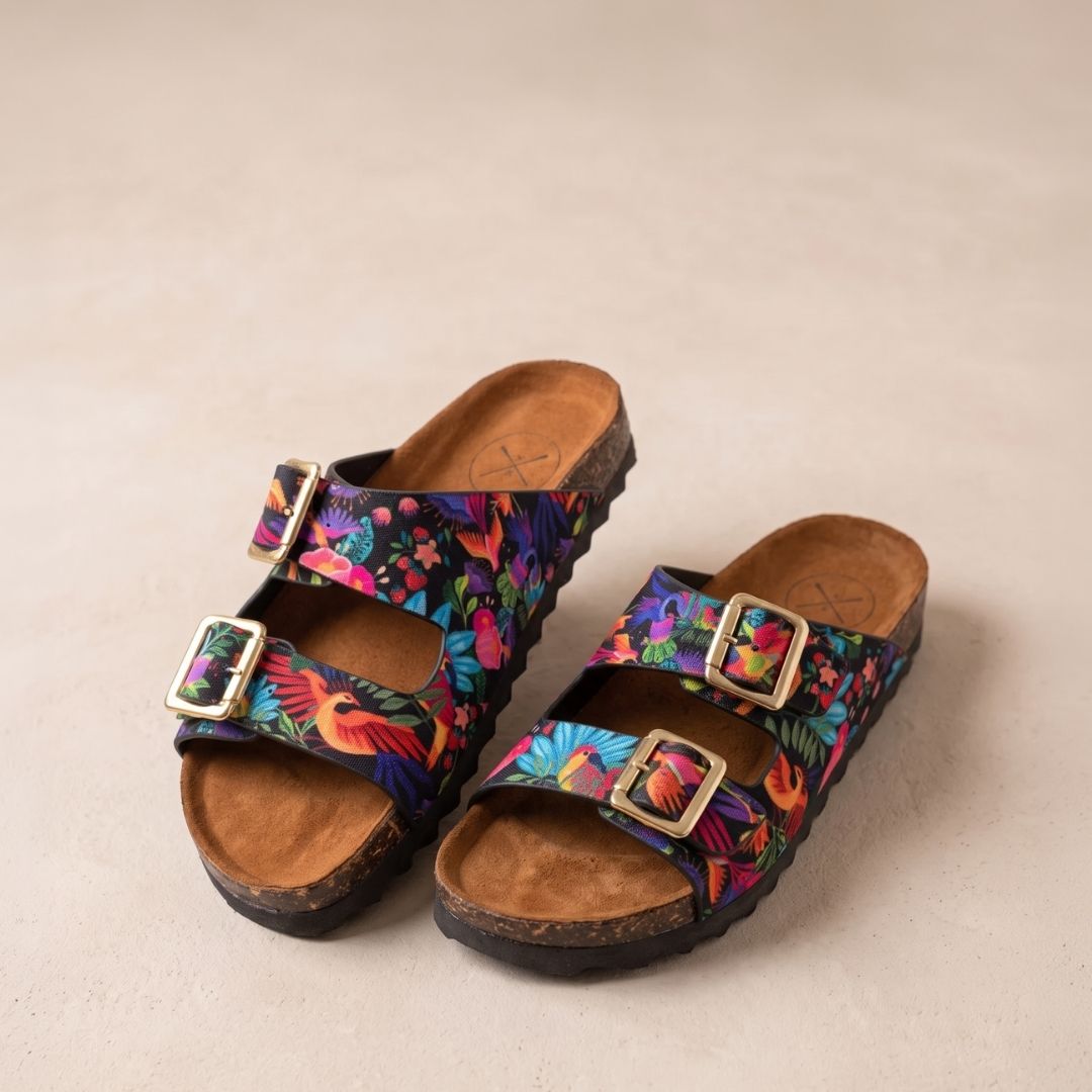 Colorful sandal on taupe background.