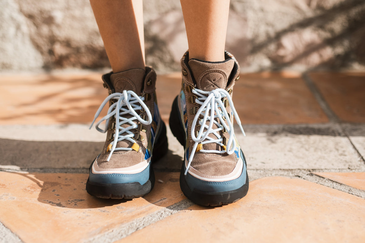Close view of the Inkkas Alpine Trekk Boot worn outdoors