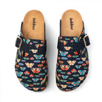A pair of clog-style mule shoes with a dark navy blue fabric upper covered in a colorful butterfly and moth pattern, featuring a single strap with a gold-tone buckle and a tan insole. The brand name 'Inkkas' is printed on the insole.