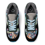 A pair of low-top sneakers shown from a top-down view on a white background. The shoes feature a dark green and black base with a vibrant multicolor tropical print on the toe boxes, light blue laces, and a gray padded collar.